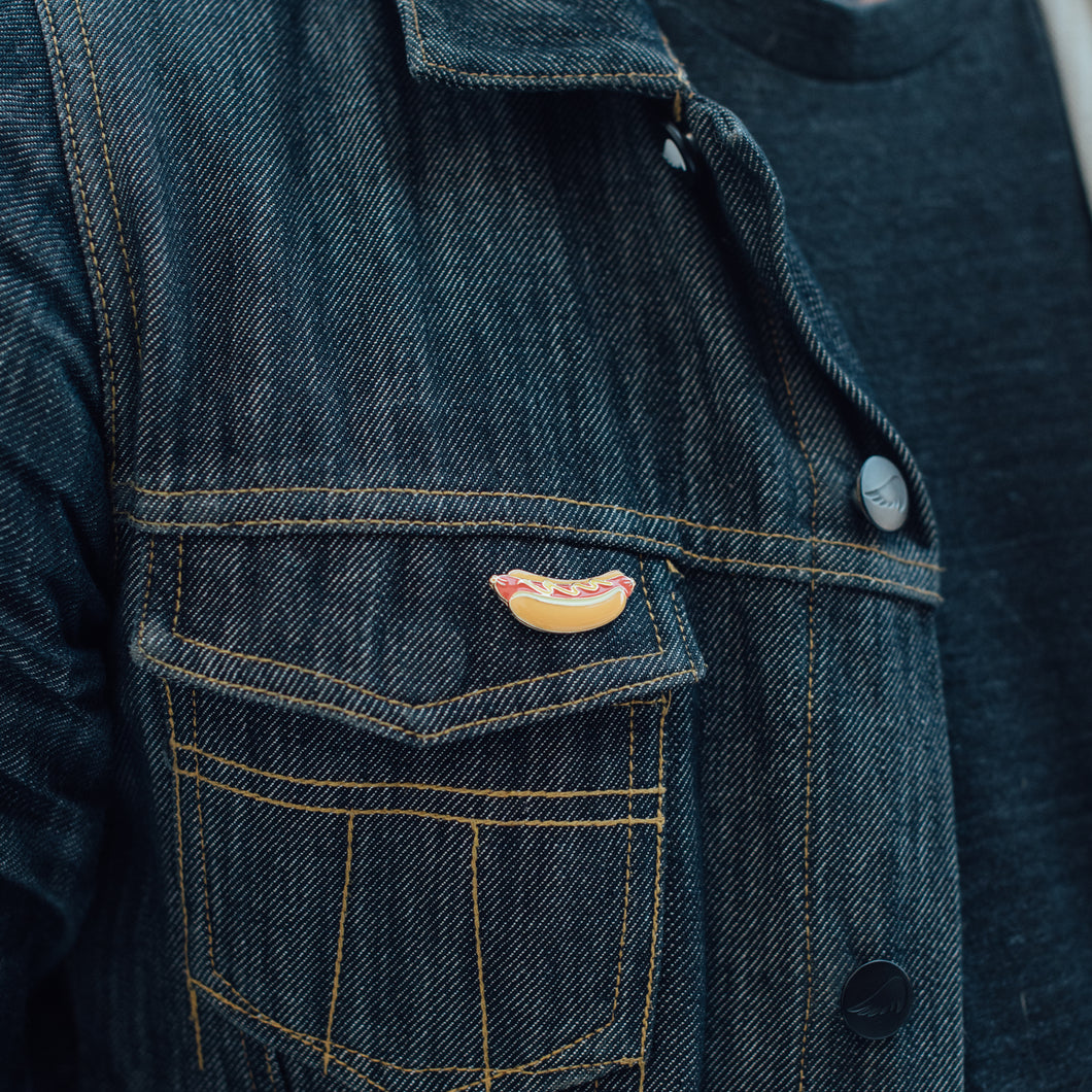 Hotdog Enamel Pin on Denim